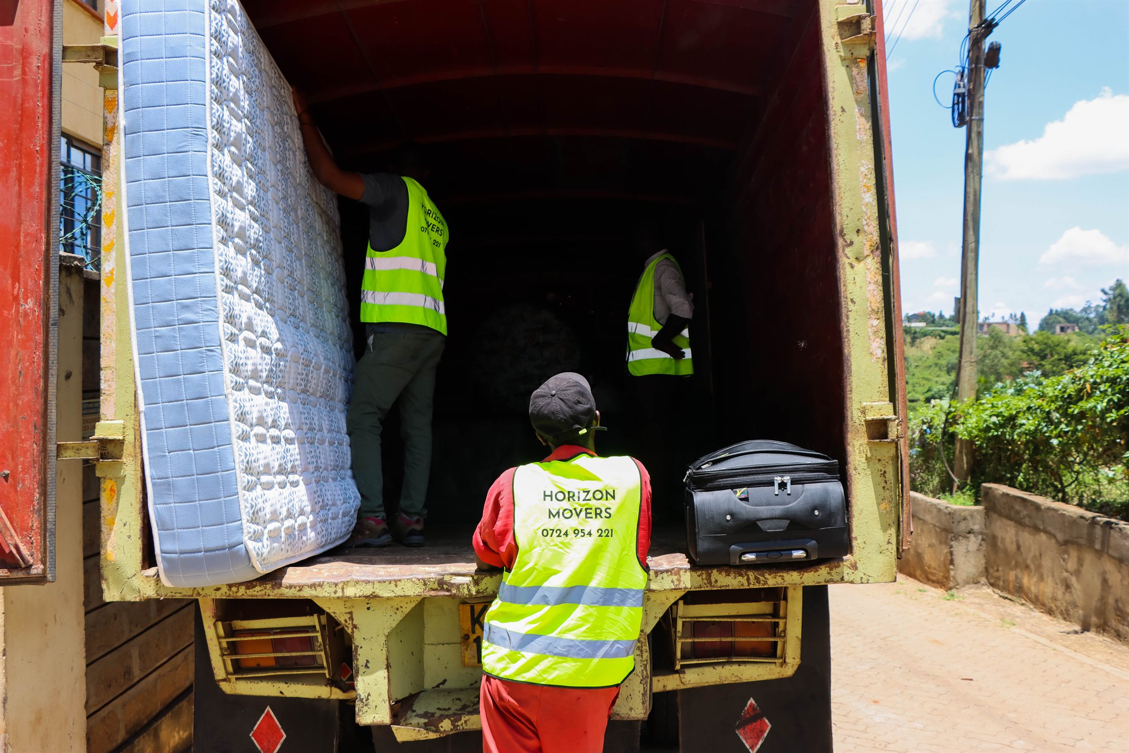Horizon Movers truck being loaded for a long distance move